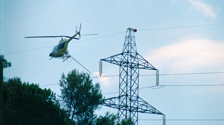 Cleaning with a lance via helicopter