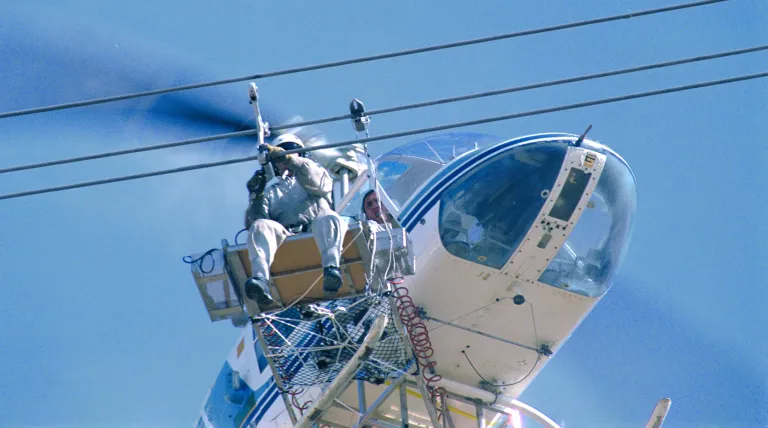 Replacement of cable separators via a platform attached to a helicopter